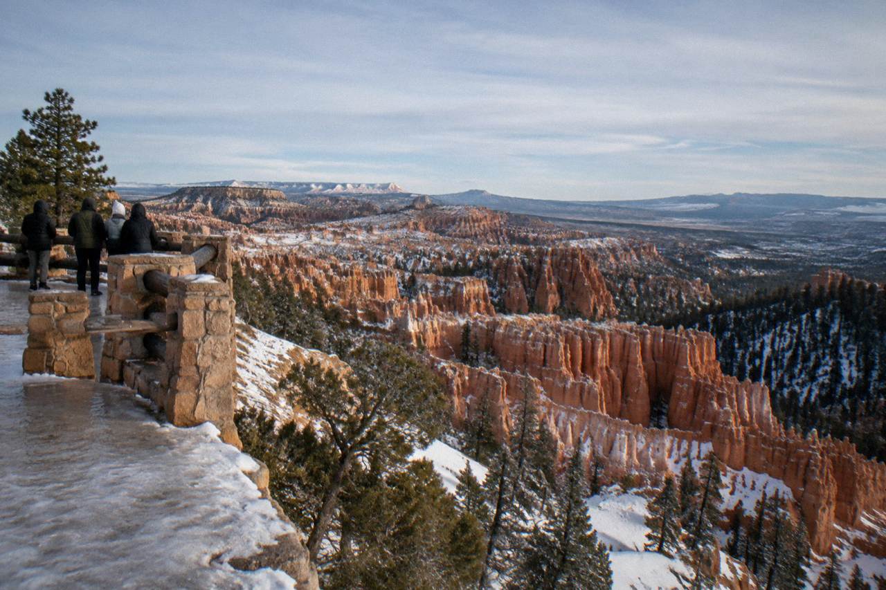 Red rock cliffs under a wide desert sky at Bryce Canyon