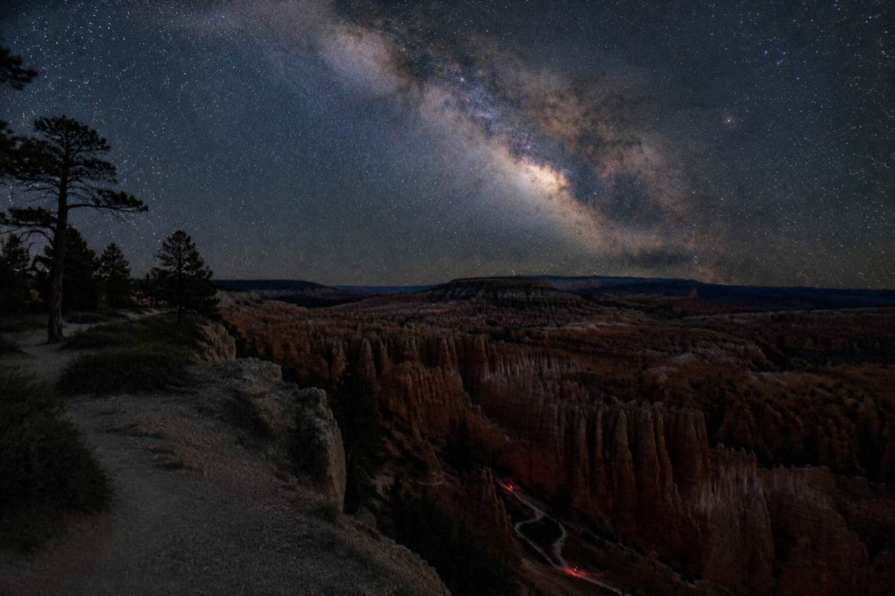 Milky Way above hoodoo silhouettes on a dark desert night