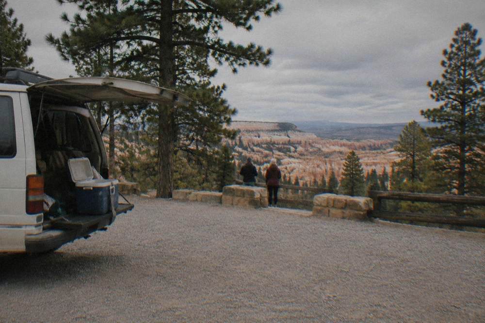 Tour van parked at an overlook along the Bryce Canyon scenic drive